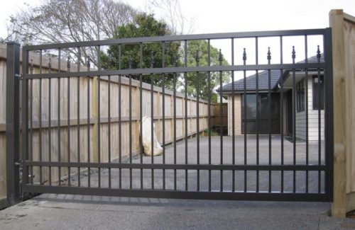 single swinging wrought iron residential security gate protecting a driveway in Morganton NC