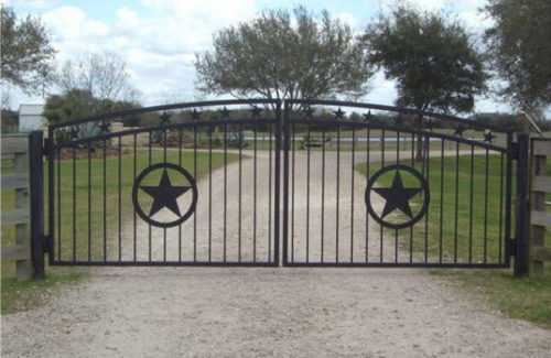 automatic driveway double swinging wrought iron gate protecting a residential driveway in Morganton NC