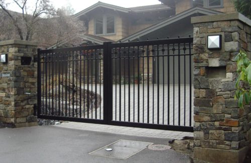 double swinging wrought iron gate protecting a residential home in Statesville NC
