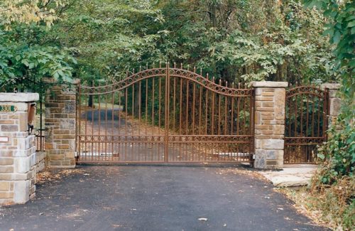 double swinging wrought iron gate securing a residential home in Lenoir NC