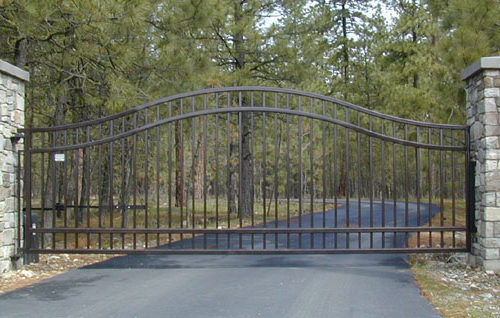 single swinging wrought iron residential gate installation in Hickory