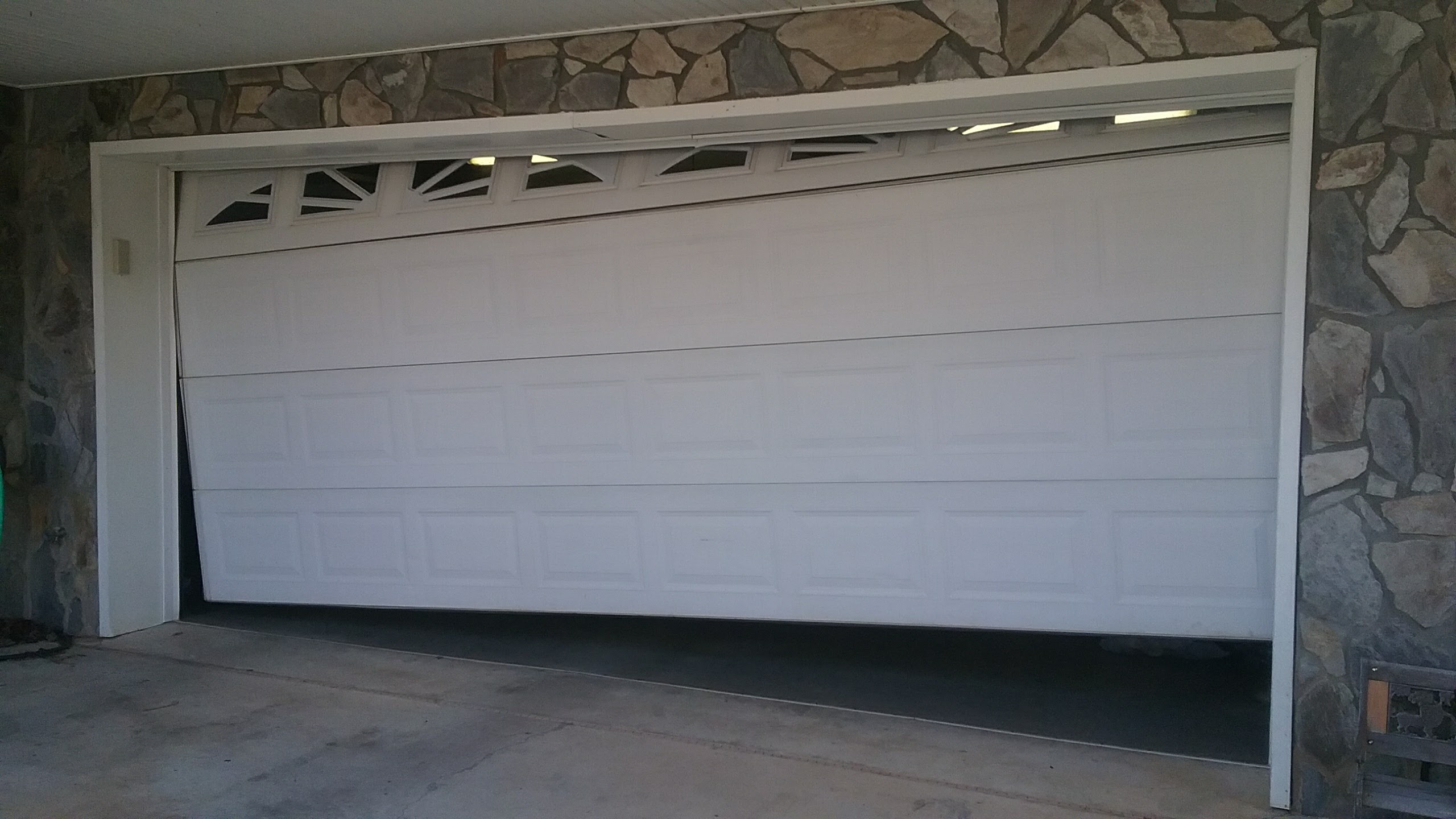 Garage Door Broken Spring Replacement