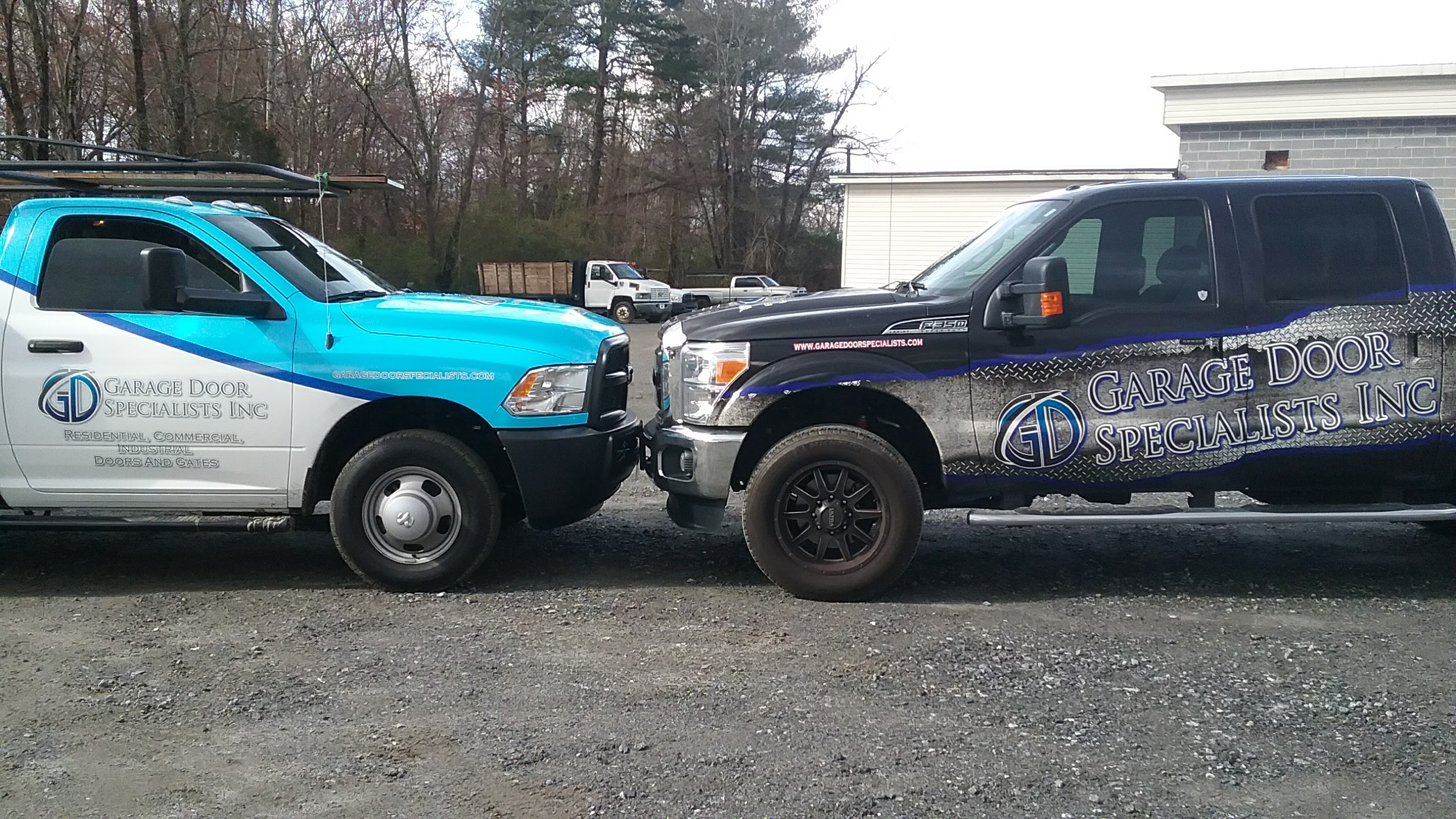 Garage Door Specialists Inc. Trucks parked next to each other