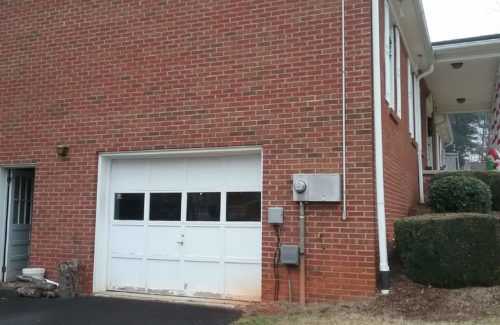 a broken residential garage door in Morganton NC