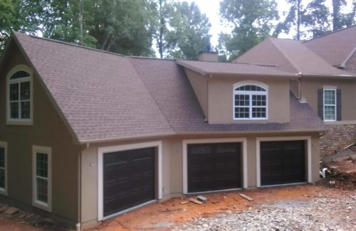 a new home with 3 new clopay garage doors